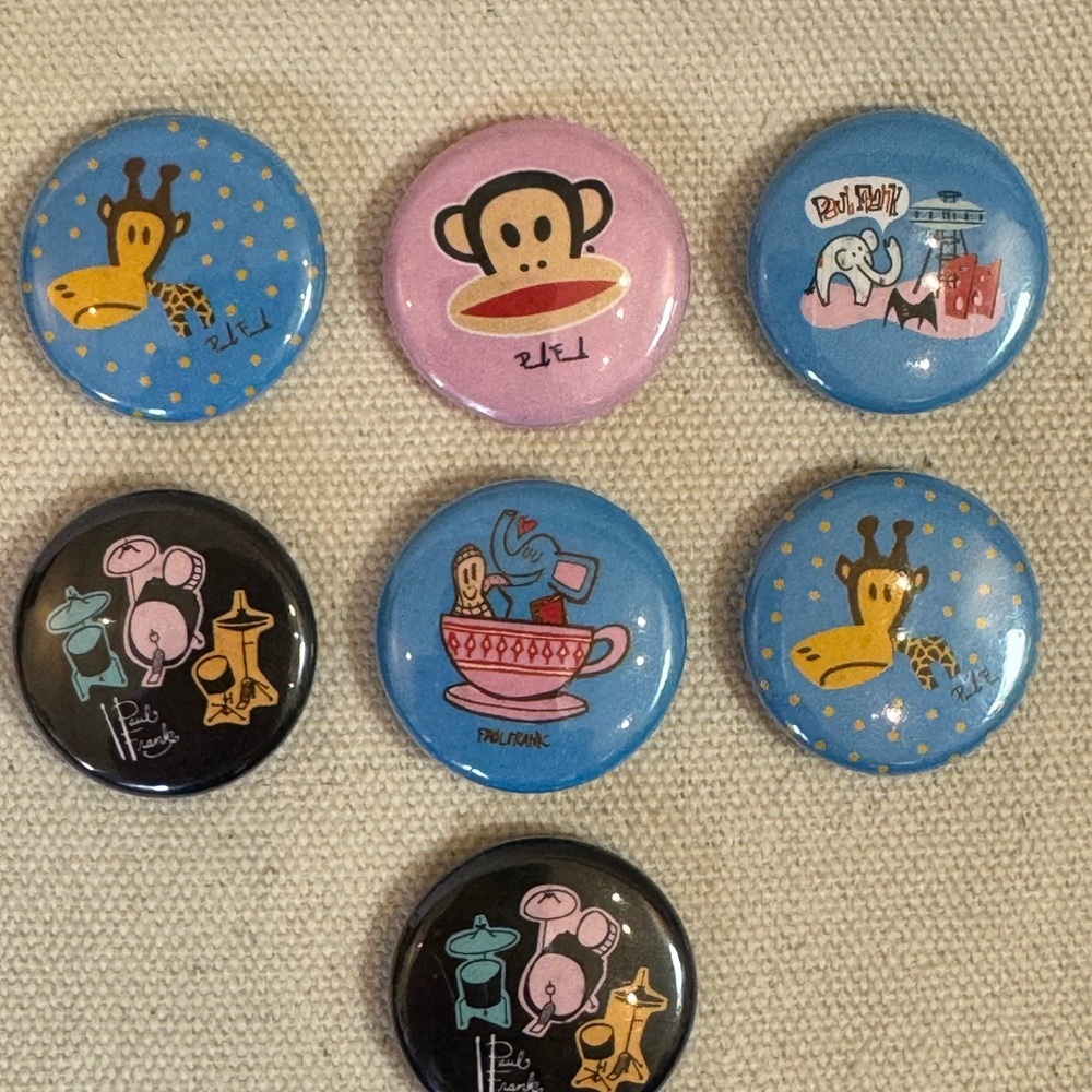 Lot of 7 new vintage Paul Frank Buttons. 1 inch each. Nostalgic and cute